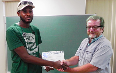 UVI Student Samuel Joseph and Bob Godfrey of the Agricultural Experiment Station 